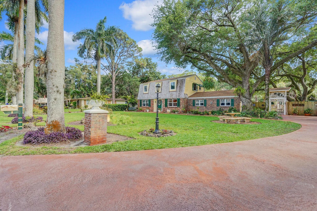 Photo of 4616 Woodmere Lane, Lake Worth, FL 33463 (MLS # R10974664)