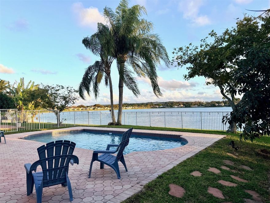 Rare opportunity in sought-after Coco Lakes! This stunning 3BR + den, 3BA pool home is the only one available and offers breathtaking views of a 55-acre navigable lake. Bright, open, and designed for modern living, it features a first-floor den with full bath, perfect for guests or a private office. The spacious kitchen offers stainless steel appliances, abundant cabinetry, and seamless flow into the main living areas. Retreat to a luxurious primary suite with dual vanities, soaking tub, and walk-in shower. Step outside to your private pool oasis and enjoy serene waterfront sunsets.