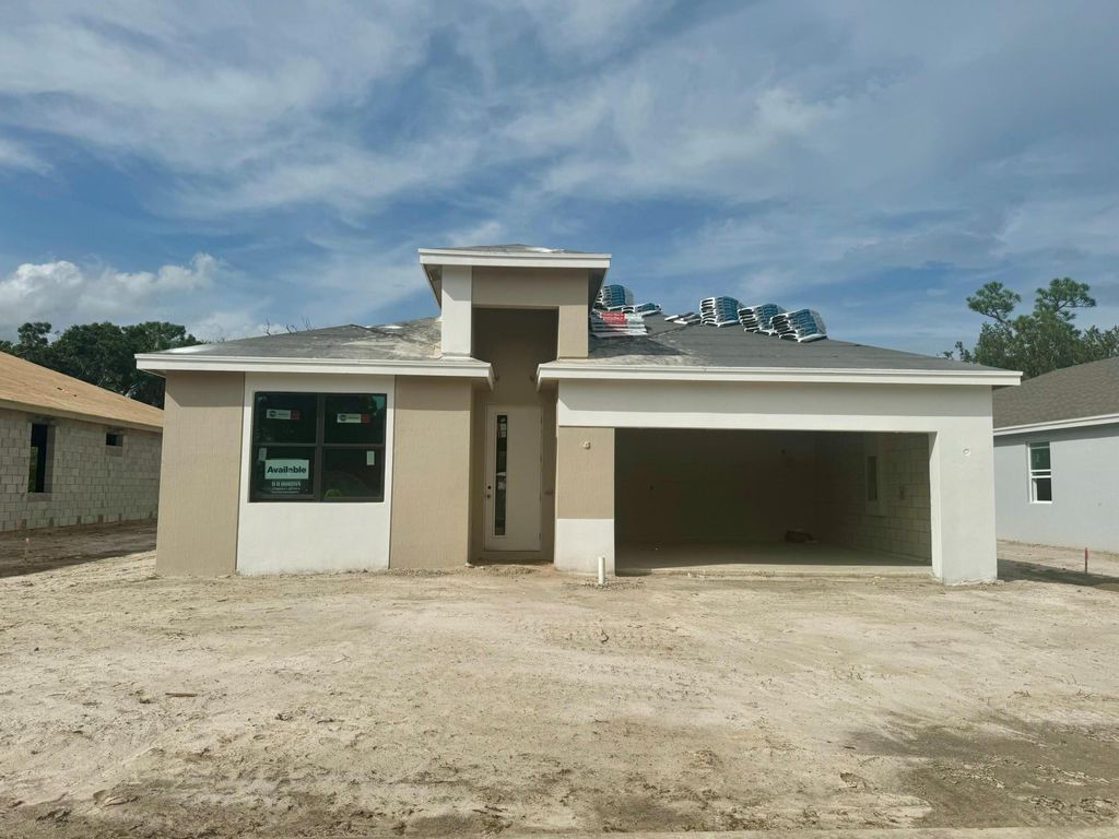 Photo of 8740 SW Kanner Oaks Drive, Stuart, FL 34997 (MLS # R11024509)
