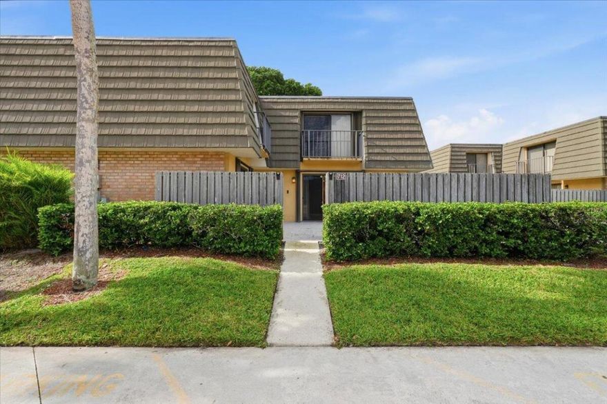 Enjoy easy living in this well-maintained townhome located in the desirable Village of Sandalwood! Residents enjoy access to three pools, tennis, basketball, pickleball, sand volleyball, exercise trails, and clubhouse amenities. The HOA includes cable, internet, water, sewer, trash, building insurance, and roof maintenance, offering outstanding value and peace of mind! Inside, the home features tile flooring downstairs, an updated kitchen with stainless steel appliances, and a private fenced patio perfect for morning coffee or relaxing evenings! Major updates include a new roof (2023), A/C (2018), and water heater (2024). Ideally located just minutes from Downtown West Palm Beach, restaurants, shopping, parks, and the airport!