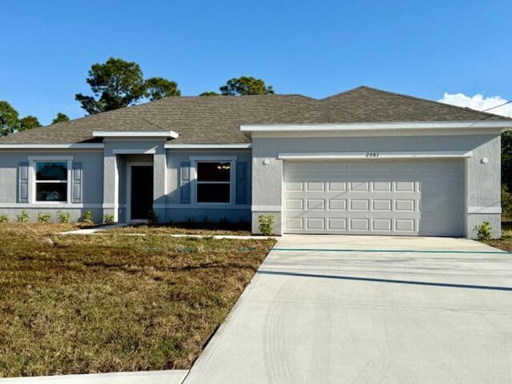 Photo of 2081 SW Fears Avenue, Port Saint Lucie, FL 34953 (MLS # R11076409)
