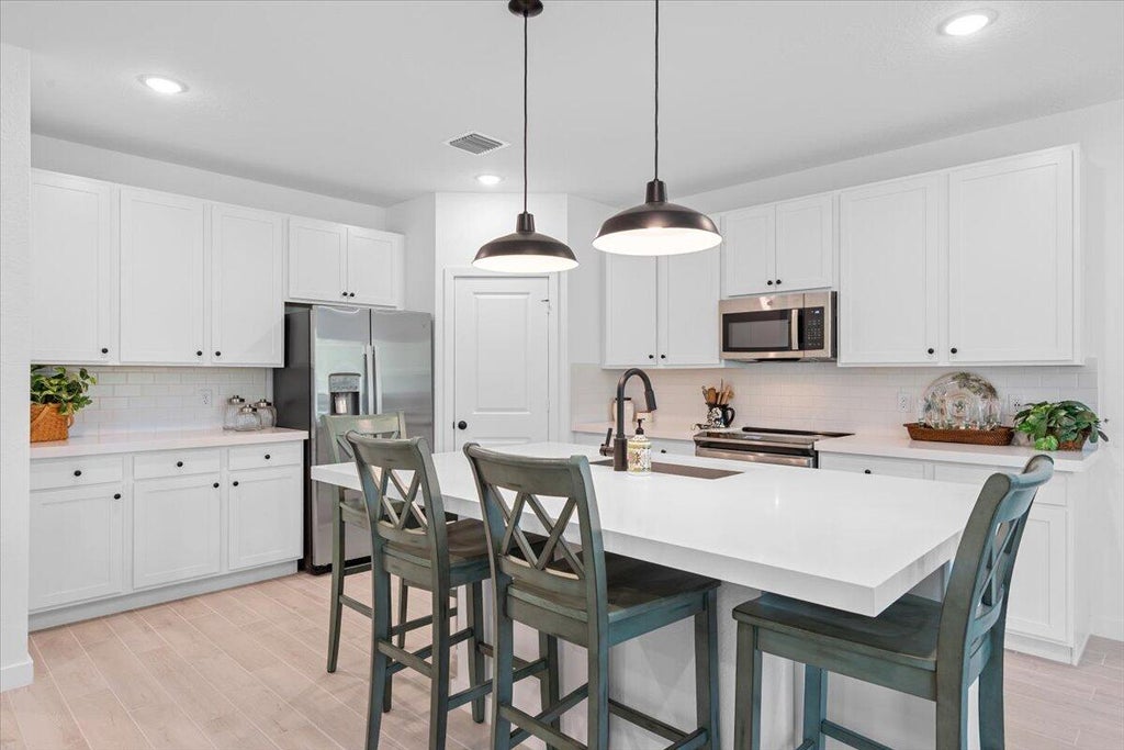 Photo of 821 NE Trailside Run, Port Saint Lucie, FL 34983 (MLS # R11096026)