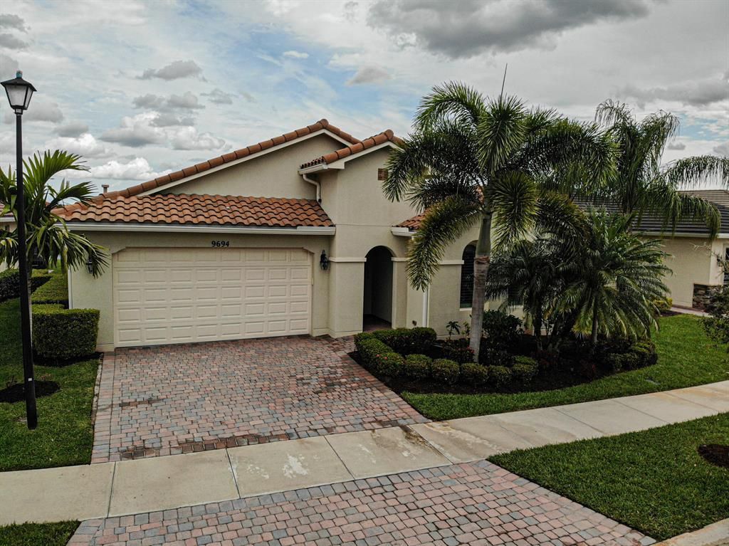 Photo of 9694 SW Royal Poinciana Drive, Port Saint Lucie, FL 34987 (MLS # R10697963)