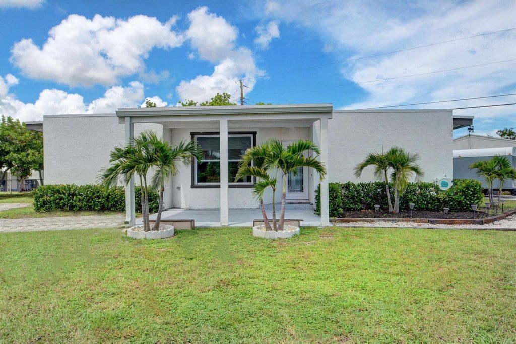 Photo of 599 Owosso Road, Lake Worth, FL 33462 (MLS # R10905688)