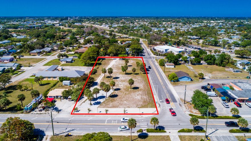 Opportunity for NOW and the future. One of the largest parcels located in the center of Port Salerno's Redevelop District. Approximately 1.3 acres. Numerous development options available. Port Salerno is a historic fishing village with lots of activity. This location is within walking distance to a number of waterfront restaurants, marinas, dockage and charter activities and seafood markets. Watch the Commercial Fishermen unload their fresh catch from the Manatee pocket riverwalk. There is a revitalization project established on and in front of the commercial waterfront, to enhance walking traffic and parking, in process now. There is plans for a ''park'' just adject from this property on Salerno Rd. In short this area is in redeveloping action now.