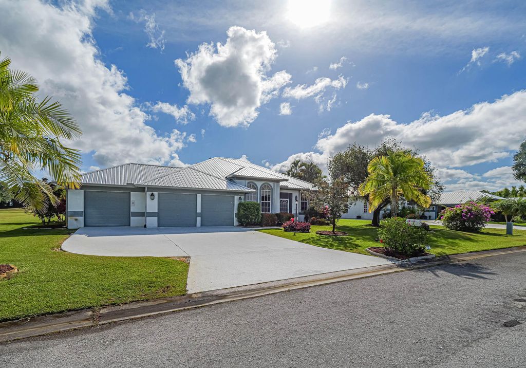 Photo of 2775 SE Bluem Way, Port Saint Lucie, FL 34952 (MLS # R10977844)