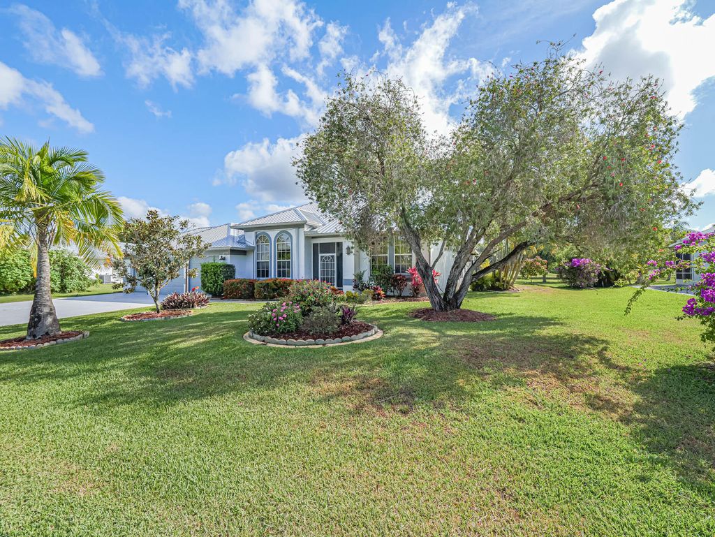 Photo of 2775 SE Bluem Way, Port Saint Lucie, FL 34952 (MLS # R10977844)