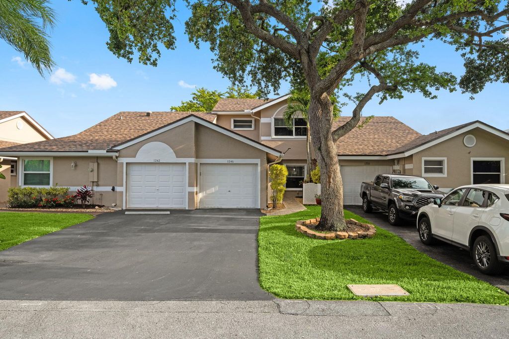 Photo of 1246 NW 51st Street, Deerfield Beach, FL 33442 (MLS # B26024713)