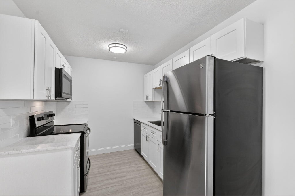 Photo of 1500 N Congress Avenue #C20, West Palm Beach, FL 33401 (MLS # B26062955)