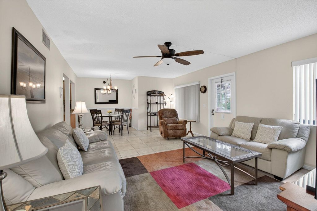 Photo of 409 Pine Glen Lane #C-1, Greenacres, FL 33463 (MLS # R11167320)