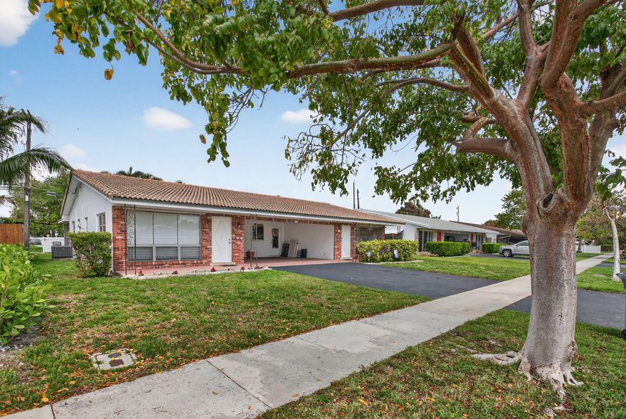 Special Duplex in prestigious Garden Isles. Great opportunity to live in one side and have the other cover expenses. Unit 1: Clean 2/2 or possible 3/2 is rented with long-time tenant who wants to stay. Unit 2: 2/1 renovated 2026. Spacious primary BR with huge closets. Both units have their own patio- with extra storage closets. Yard is shared, but divided by privacy fence. Each unit has it's own separate laundry room. They share the 2 car carport. The neighborhood sidewalks make for easier access to the Supermarket, Calypso and several other restaurants that are close by. Pickleball courts and park are 2 blocks away. Close to beach! Tile roof replaced in 2004. A/C and water heater replaced in both units within the last year. Information on expenses and income available upon request.  Location and condition make this duplex a special opportunity. Great option to live in one side and have the other cover expenses. One unit: 2/2 or possible 3/2 has a longterm tenant- of 10 years who would like to stay. Second unit: 2/1 Vacant and beautifully remodeled. Both have private patios and shared yard.  Lots of storage- each has its own laundry room with access to shared carport. Located in upscale Garden Isles. Stones throw to restaurants, Publix, park and Pickleball courts. Only 2 easy miles to the beach!