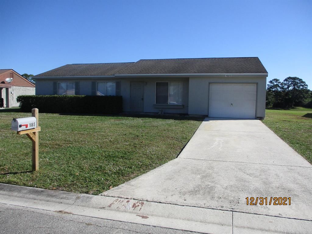 Photo of 1665 SE Burgundy Lane, Port Saint Lucie, FL 34952 (MLS # R10769689)