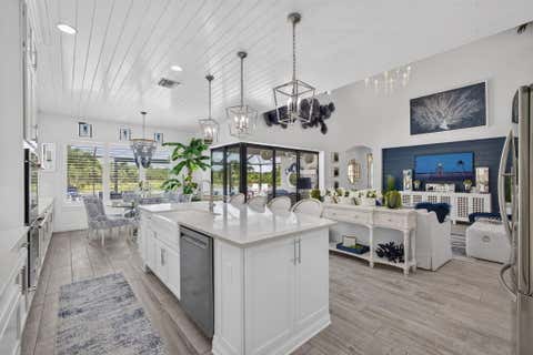 Photo of 217 Blanca Isles Lane, Jupiter, FL 33478 (MLS # B26061546)