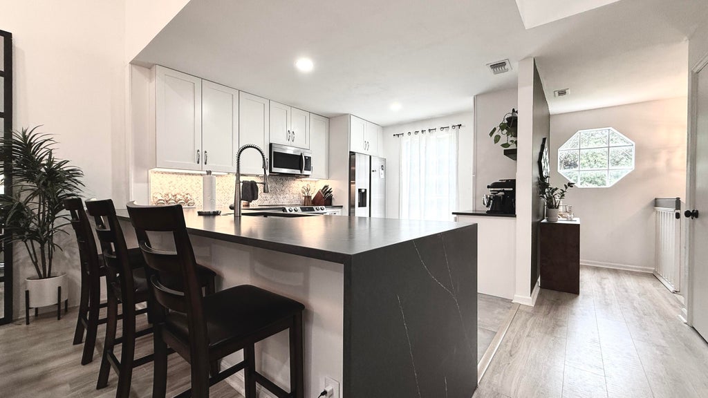 Photo of 5016 Heatherhill Lane #10, Boca Raton, FL 33486 (MLS # R11146623)
