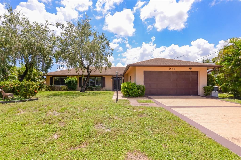 Photo of 974 SE Atlantus Avenue SE, Port Saint Lucie, FL 34986 (MLS # R10741010)