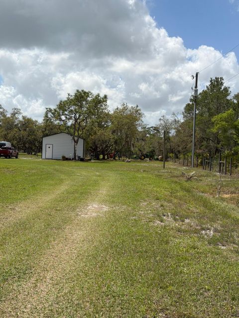 Photo of 34955 NE 4th Drive, Okeechobee, FL 34972 (MLS # B26011094)