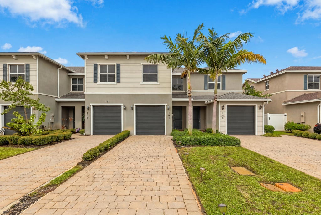 Photo of 141 BANDOL Street, Riviera Beach, FL 33404 (MLS # B26080410)