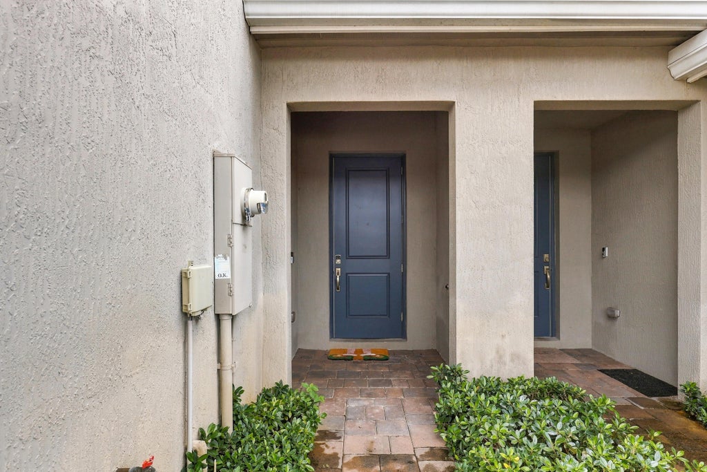 Photo of 141 BANDOL Street, Riviera Beach, FL 33404 (MLS # B26080410)