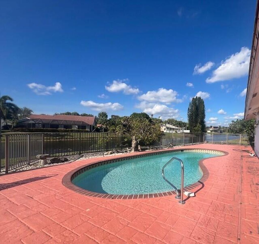 Photo of 8725 Banyan Court, Tamarac, FL 33321 (MLS # B26020906)