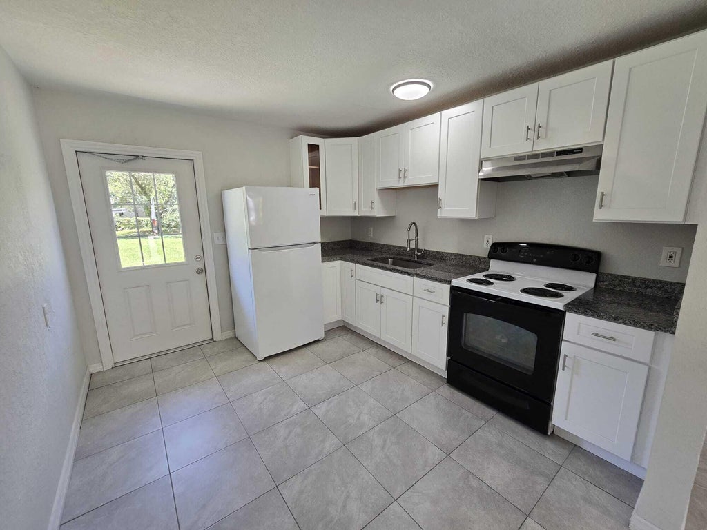 Photo of 4003 AVENUE I #A, Fort Pierce, FL 34947 (MLS # B26073501)