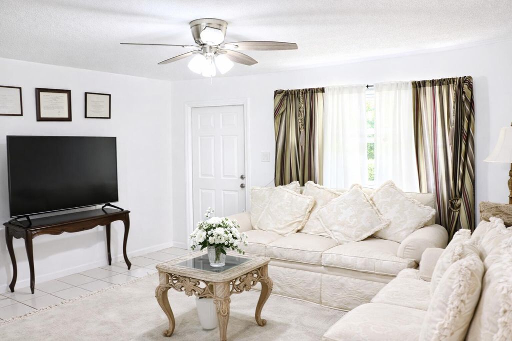 Photo of 1440 NW 70th Lane, Margate, FL 33063 (MLS # B26005315)