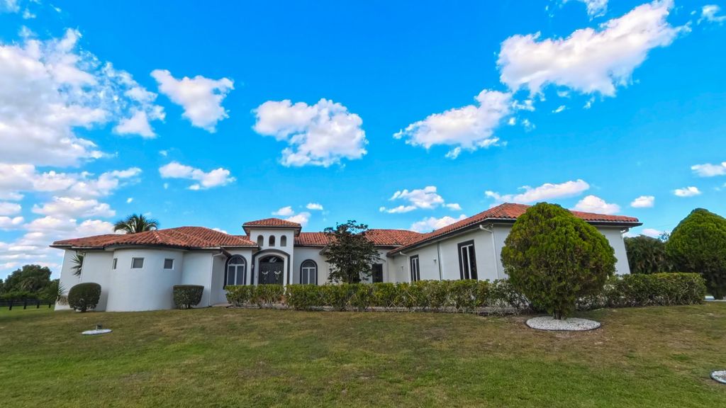 Photo of 14225 43rd Road N, Loxahatchee, FL 33470 (MLS # R11143062)