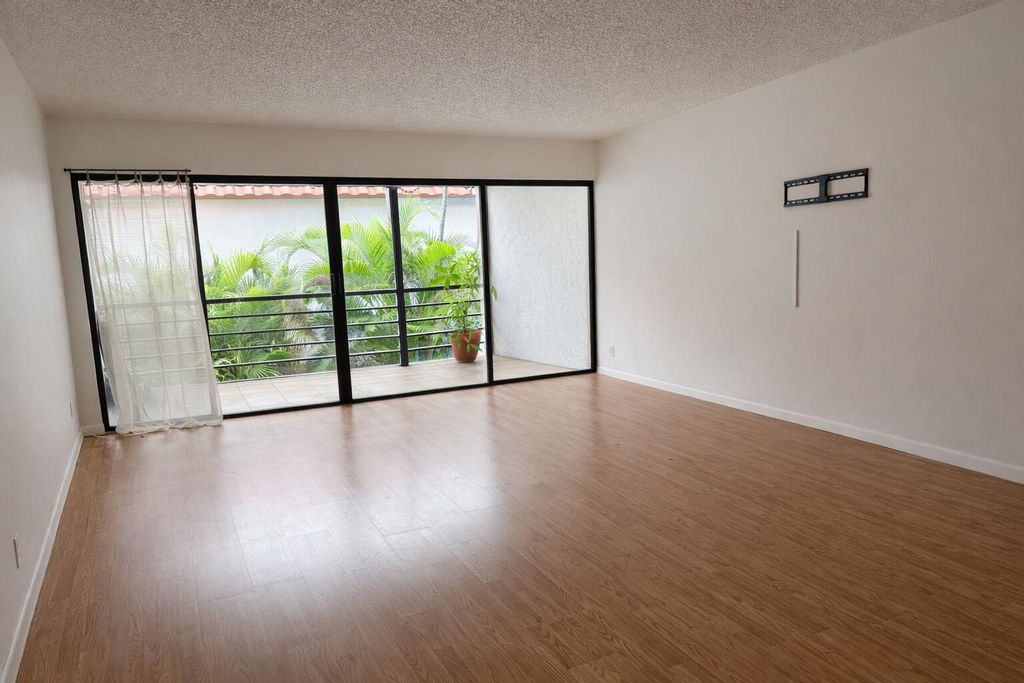 Photo of 2001 Woolbright Road, Boynton Beach, FL 33426 (MLS # B26012785)