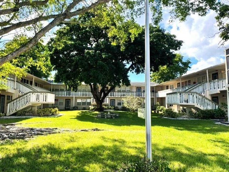 First floor 1/1.5 garden view. 55+ gated community Clean and interior just painted. Up graded kitchen with granite counter tops. New electrical panel and tankless water heater in 2023. Rentable building. Bus service throughout Century Village and outside to the local stores. The most active clubhouse in Deerfield Beach. 3.5 miles to one of the Best Beaches in South Florida. Centrally located, only a mile to I-95, The Turn Pike and the Sawgrass Expressway.