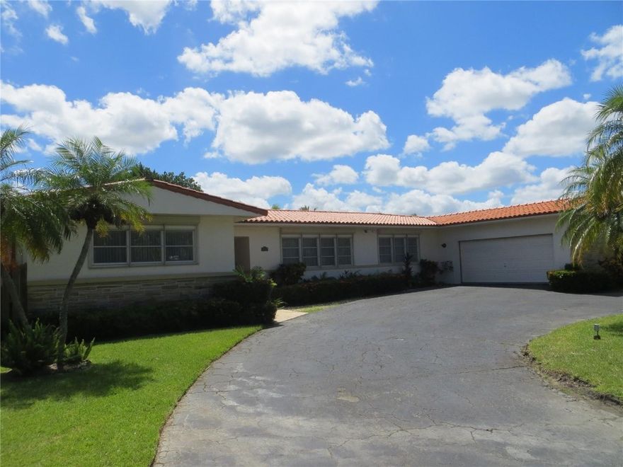 THE PRIDE OF OWNERSHIP IS EVIDENT IN THIS OUTSTANDING FOUR BEDROOM, THREE BATH POOL HOME FOR SALE IN HOLLYWOOD LAKES. THIS WELL BUILT, SPACIOUS HOME FEATURES A HUGE LIVING ROOM OVERLOOKING THE SPARKLING SCREENED POOL & LARGE FENCED YARD FOR PRIVACY. UPDATED EAT IN KITCHEN & MASTER BATHROOM. WALK IN CLOSETS, LARGE BEDROOMS, STORM SHUTTERS, TILE ROOF, TWO CAR GARAGE WITH NEW GARAGE DOOR & DRIVEWAY WITH AMPLE PARKING. EXCELLENT LOCATION, WALK TO THE SHORE OF SOUTHLAKE & JUST A SHORT BIKE RIDE TO THE BEACH FROM THIS WONDERFULL NEIGHBORHOOD, ONE OF THE BEST IN HOLLYWOOD. EASY ACCESS TO FORT LAUDERDALE OR HALLANDALE BEACH, AVENTURA & MIAMI. THIS HOME ALSO BOASTS A OVER-SIZED POOL & SCREENED PATIO WITH COVERED SITTING AREA.  3,356 TOTAL ADJUSTED SQ. FT.  OUTSTANDING POTENTIAL WITH THIS HOME.