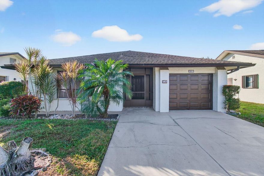 Welcome to 6100 Olivewood Ct. This charming residence offers an open floor plan with two spacious bedrooms and two full bathrooms. The kitchen has been updated and the enclosed sunroom adds extra square footage, making this a larger model than most. Step outside to enjoy your own private patio, complete with a mango tree.
This active community provides numerous amenities such as a pool, spa, tennis and bocce ball courts, a clubroom, fitness center, and even a fishable lake.