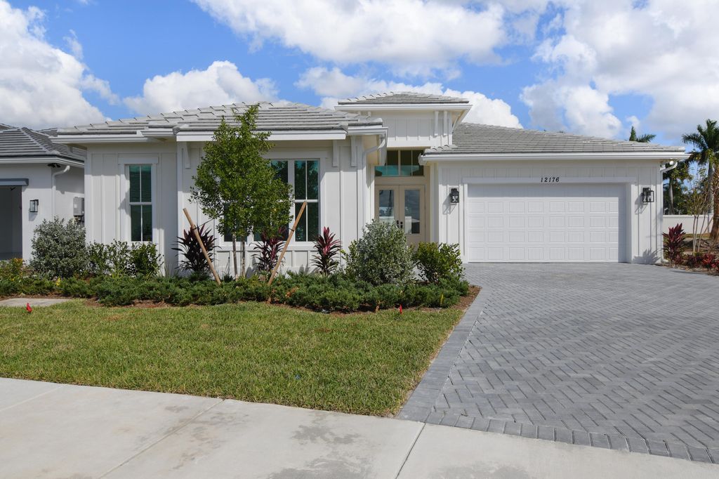 Photo of 12176 Waterstone Circle #39, Palm Beach Gardens, FL 33412 (MLS # R10939472)