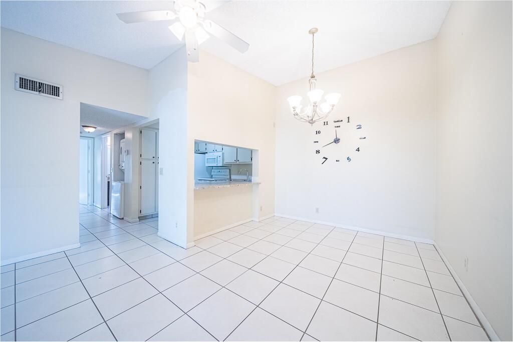 Photo of 202 Foxtail Drive #A3, Greenacres, FL 33415 (MLS # R11121305)