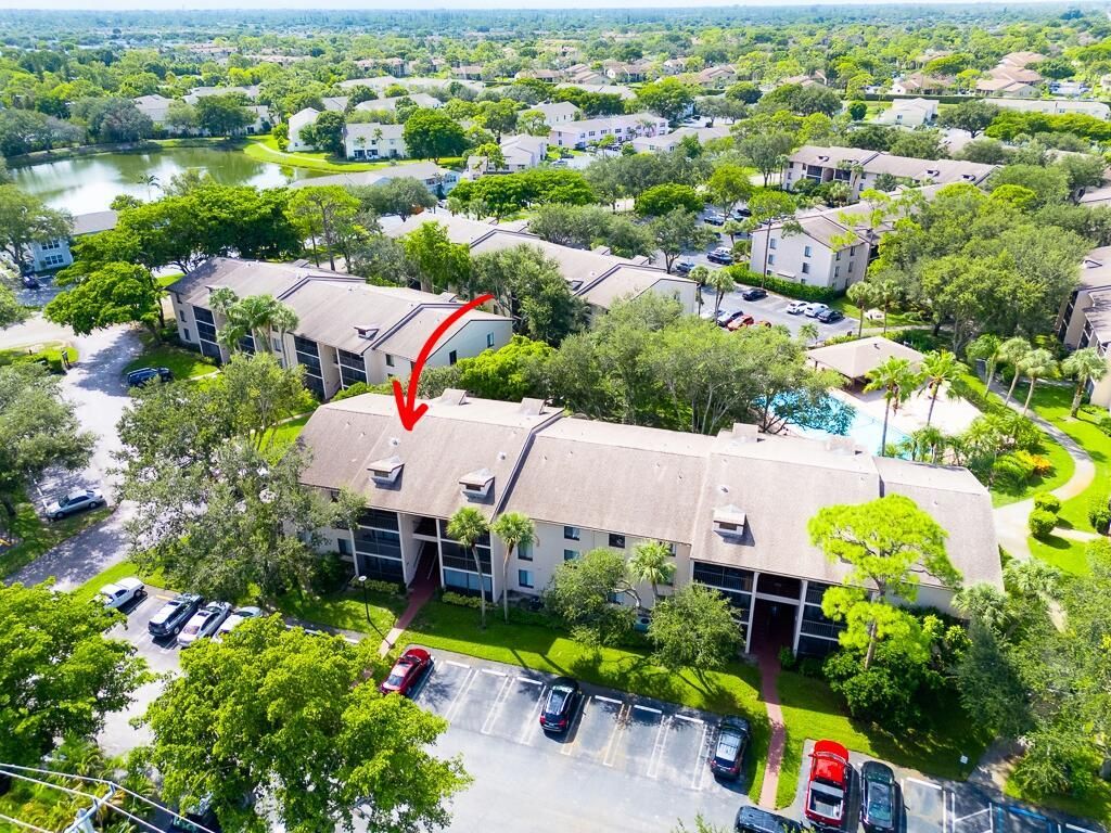 Photo of 202 Foxtail Drive #A3, Greenacres, FL 33415 (MLS # R11121305)