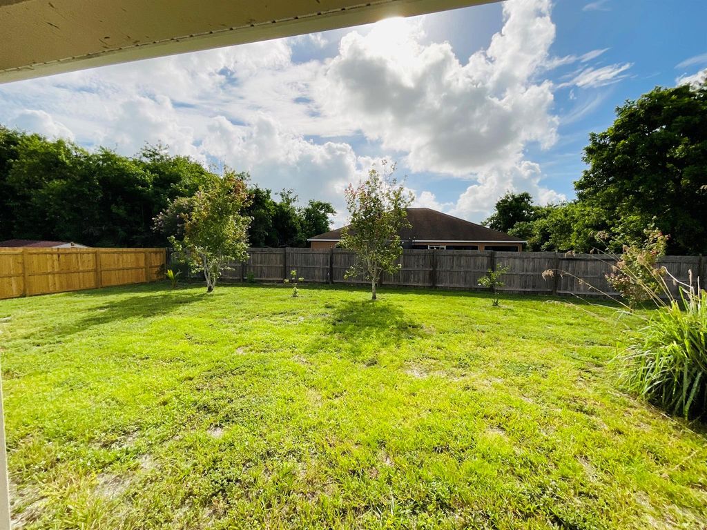 Photo of 4281 SW Carl Street, Port Saint Lucie, FL 34953 (MLS # R11006582)