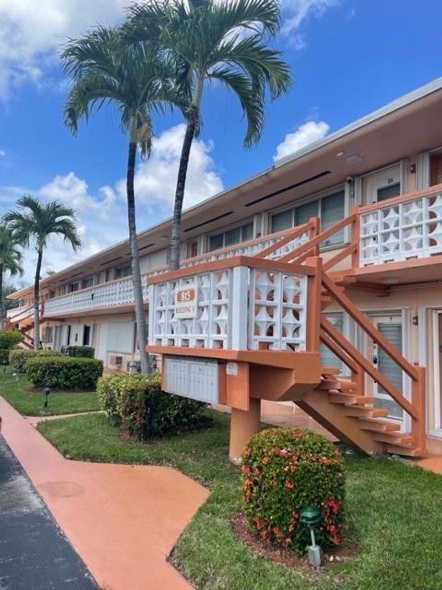 Delightful and affordable one bedroom one bath second floor unit with front door and rear door access. Excellent opportunity for relaxed Florida year-round or vacation living. Enjoy the refreshing pool, club house, gym and serene lake.  Property is conveniently close to beaches, Gulf Stream Casino, and shopping.  Don't miss this one!