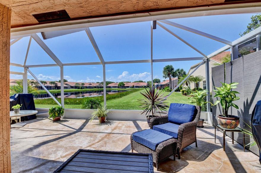 Move right into this lovely lakefront villa featuring 2 bedrooms + den, vaulted ceilings, skylights, & open floor plan. Step outside to enjoy serene lake views from the covered & open extended screened-in patio. Recent upgrades include: hurricane impact front door, 2021 AC with ultraviolet sanitizer system & air duct cleansing, 2022 HWH, 2021 W/D, new driveway pavers & epoxy garage floor. Enjoy a pest-free home with the built-in pest defense system. Kitchen features stainless steel appliances & white cabinets. Bedroom carpets replaced in 2021. Venetian Isles, an active 55+ pet friendly community, offers a fabulous brand new renovated clubhouse with restaurant and bar, new fitness center, 2 resort-style pools (including resistance pool), tennis, pickleball, bocce, putting green and more!