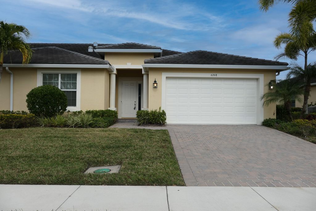 Photo of 6268 NW Helmsdale Way, Port Saint Lucie, FL 34983 (MLS # R10947800)