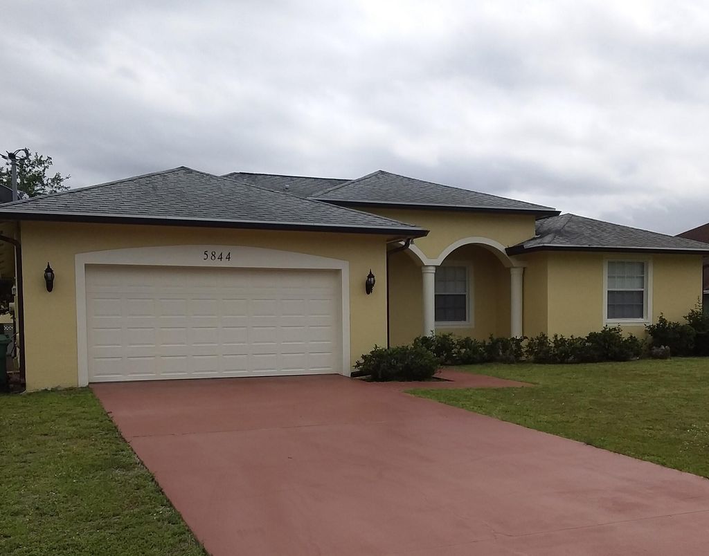 Photo of 5844 NW Hann Drive, Port Saint Lucie, FL 34986 (MLS # R10789364)