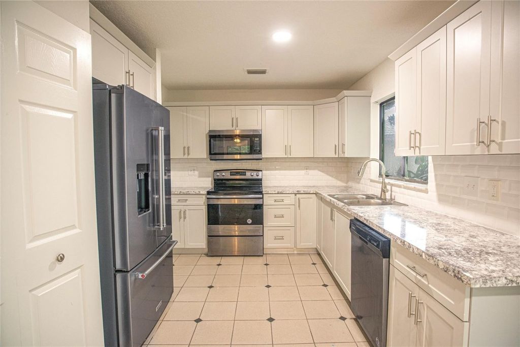 Photo of 7942 NW 37th Drive, Coral Springs, FL 33065 (MLS # F10520998)