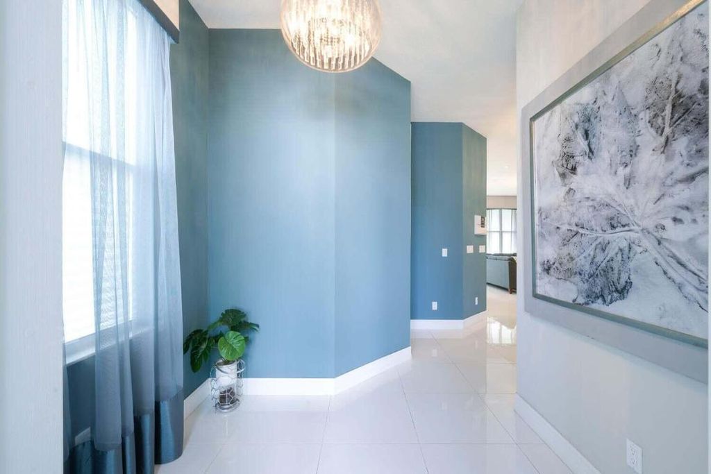 Photo of 1932 Juno Landing Lane, North Palm Beach, FL 33408 (MLS # R11152228)