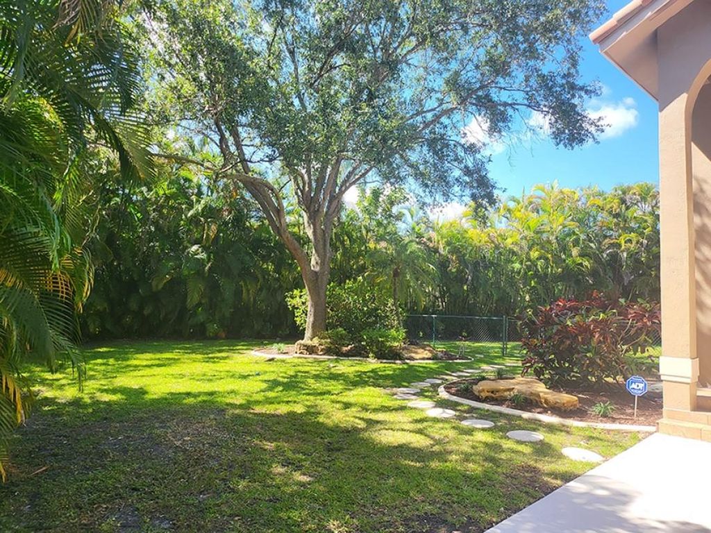 Photo of 5811 NW 60th Street, Parkland, FL 33067 (MLS # F10429894)