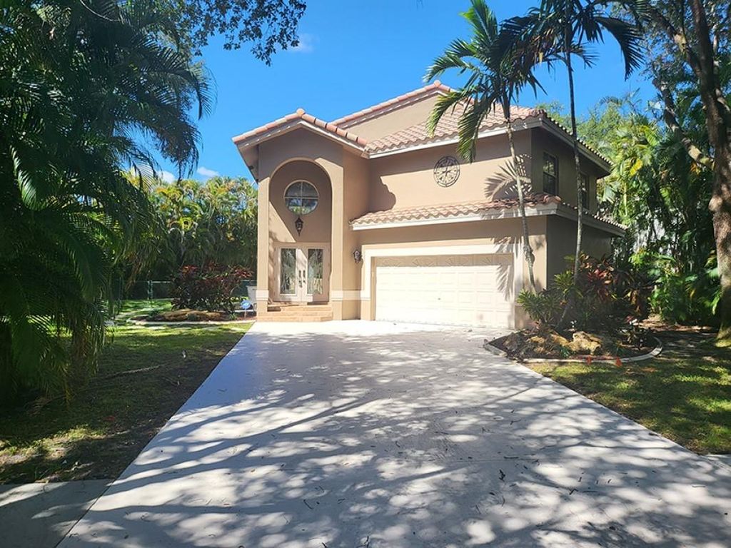 Photo of 5811 NW 60th Street, Parkland, FL 33067 (MLS # F10429894)