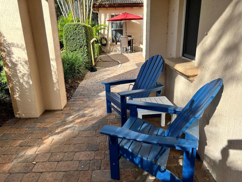 Photo of 750 Bocce Court, Palm Beach Gardens, FL 33410 (MLS # R10940906)