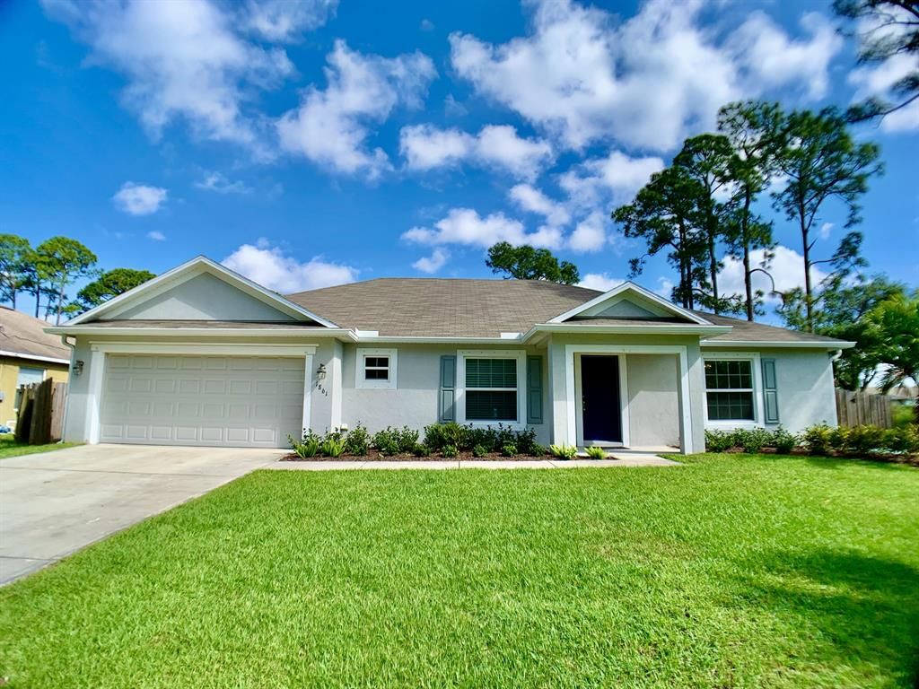 Photo of 1861 SW Michelangelo Avenue, Port Saint Lucie, FL 34953 (MLS # R10786499)