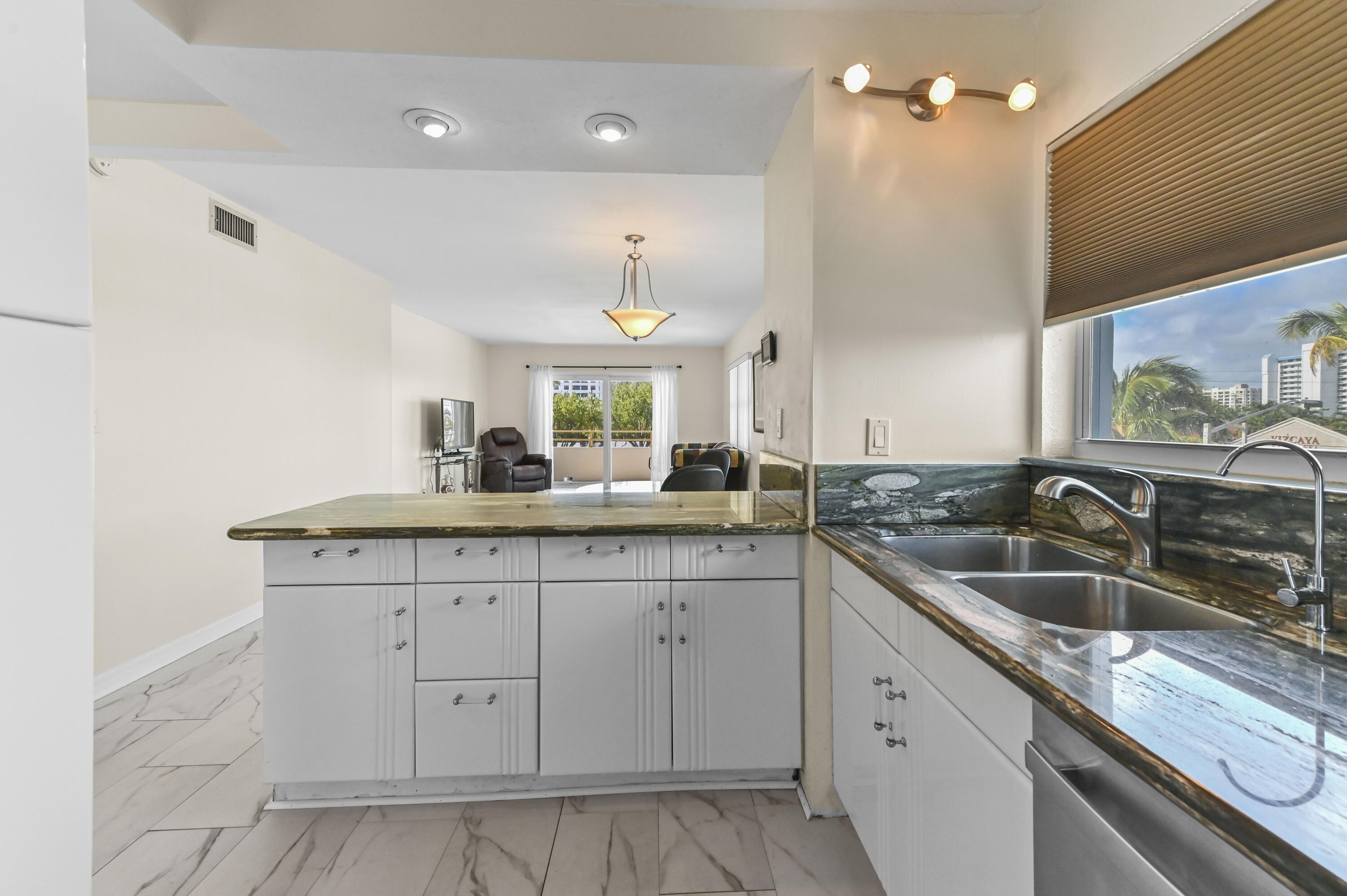 TIFFANY GARDENS WEST CONDO - Residential