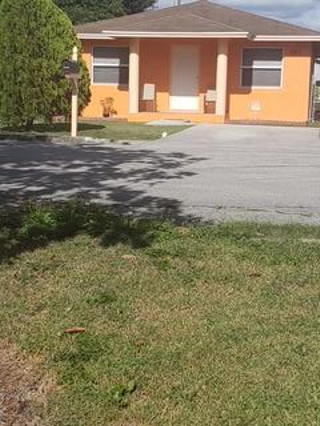 Photo of 260 NW 2nd Avenue, South Bay, FL 33493 (MLS # R11137665)