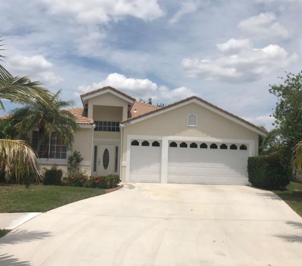 Photo of 1235 SW Briarwood Drive, Port Saint Lucie, FL 34986 (MLS # R10714975)