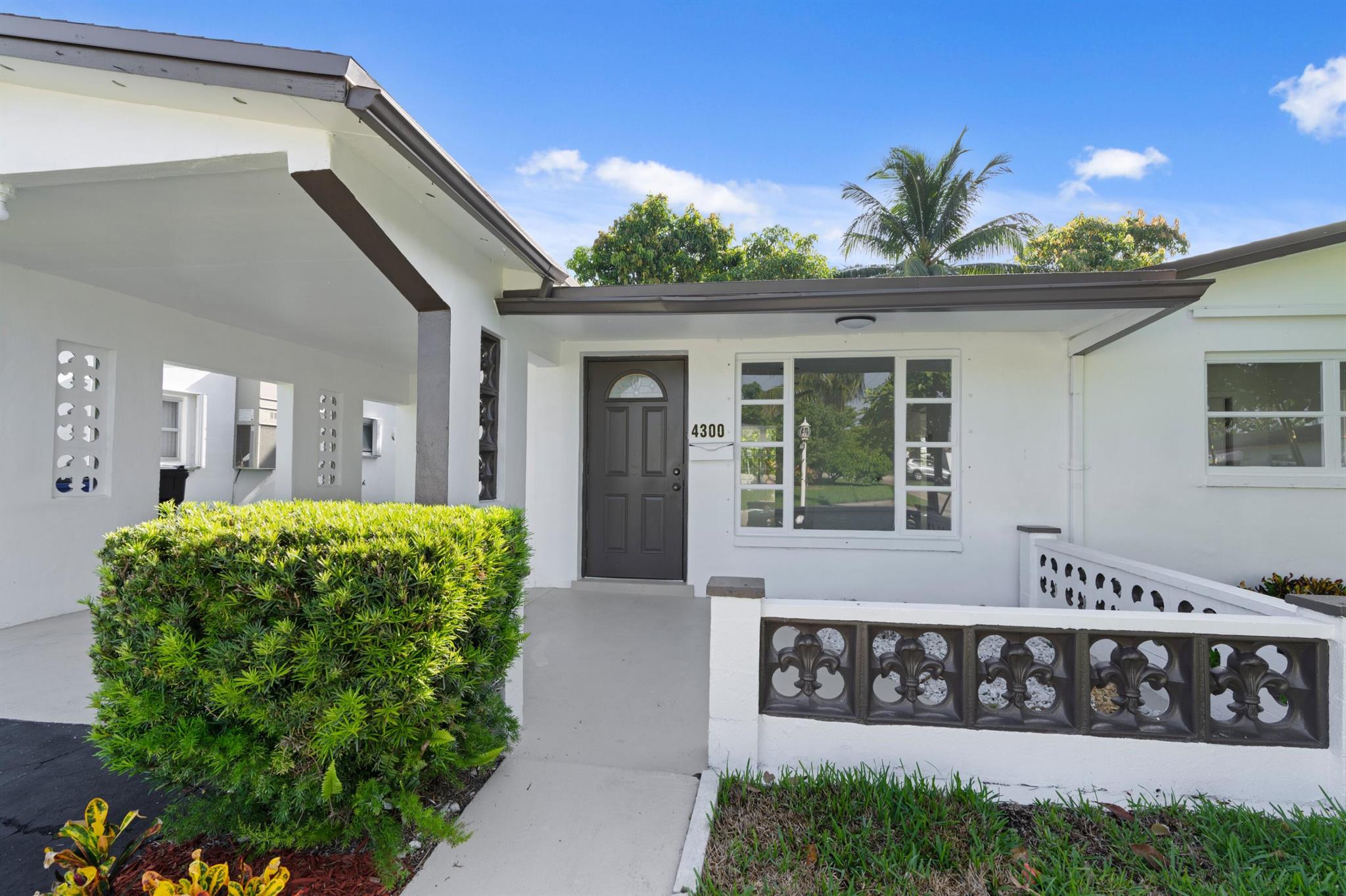 Welcome to this beautifully renovated single-family home nestled on a quaint and serene canal. With 1,600 square feet of light-filled living space, this 2-bedroom, 2-bathroom gem offers a thoughtfully designed layout that feels spacious, inviting, and truly turnkey.From the moment you step inside, you're greeted by an abundance of natural light and an immediate view of the lushly landscaped backyard that gently rolls into the picturesque canal. The open floor plan seamlessly connects each living space, enhanced by tasteful upgrades from floor to ceiling.