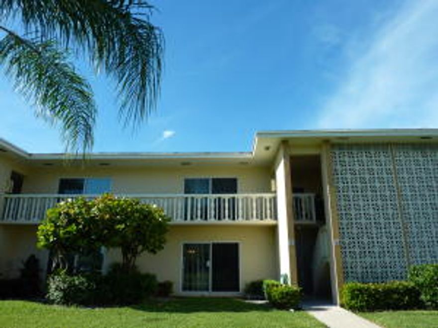 Wonderful remodeled First Floor condo in High Point West, Boynton Beach, FL.Close to the beach, shopping and restaurants!  Granite Counter Island in kitchen with white cabinets and appliances is opened up to the living/dining area to add spaciousness. New white bathroom vanity with storage.  Newer A/C and Appliances.  Lots of closet space.  Bedroom sliders lead to a sun porch/florida room which can be used as an office, den or extra guest bedroom.  Enlarged rear patio with large patio pavers.  Impact glass windows.  Laminate floors in kitchen, dining area and living room.  Newer neutral carpeting in bedroom and porch.  Service contract for A/C and most appliances is transferrable to buyer at closing.