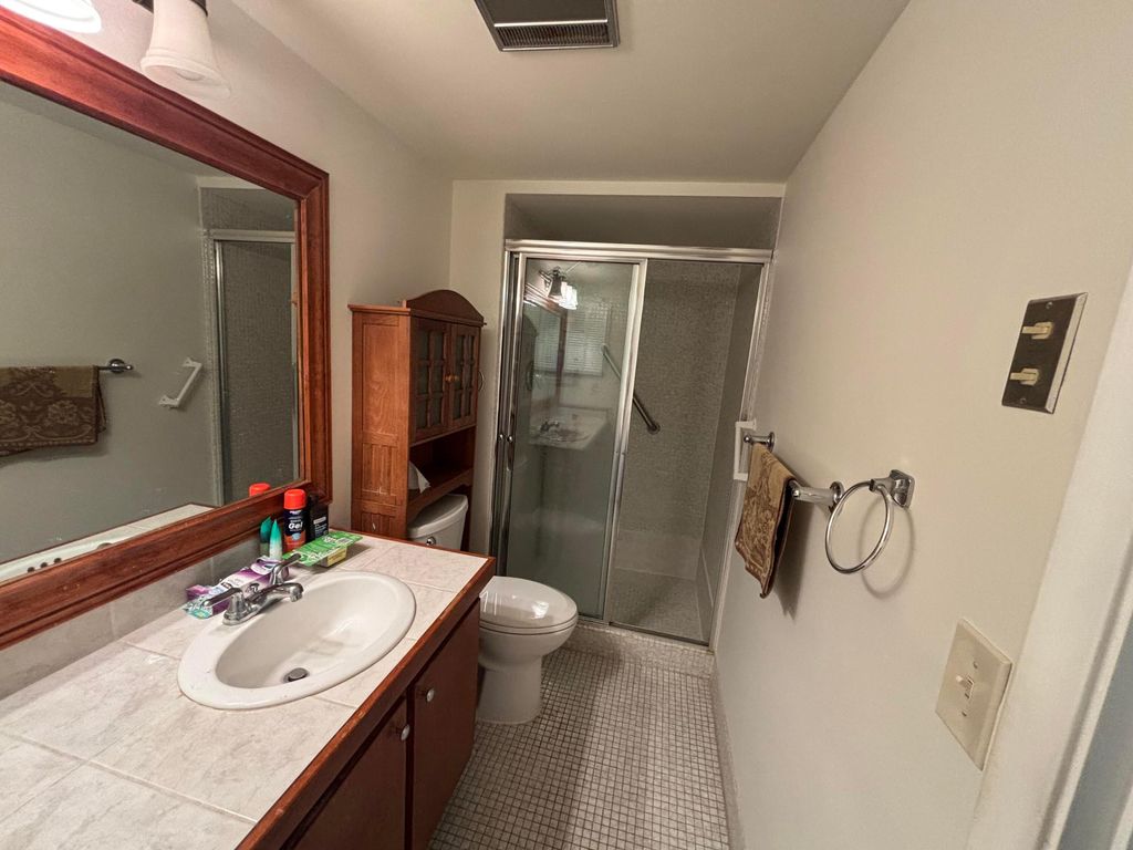 Photo of 105 E Wellington Dr #105, West Palm Beach, FL 33417 (MLS # B26017762)